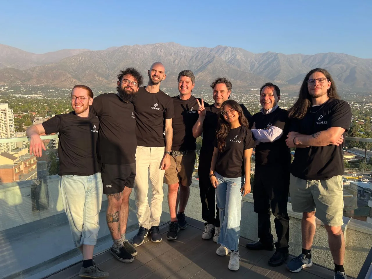 The Visual-IQ team together on a terrace overlooking Santiago
